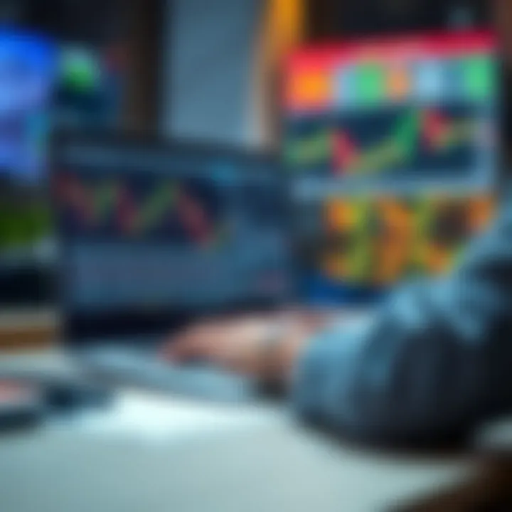 Individual using a laptop to access online forex trading courses with financial graphs on the screen